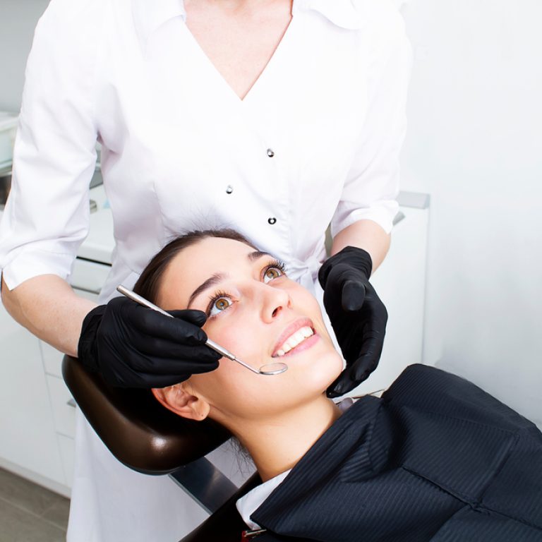 Gum,Treatment.,Periodontist,And,Patient,At,Dentistry,Clinic.,Periodontology.,New